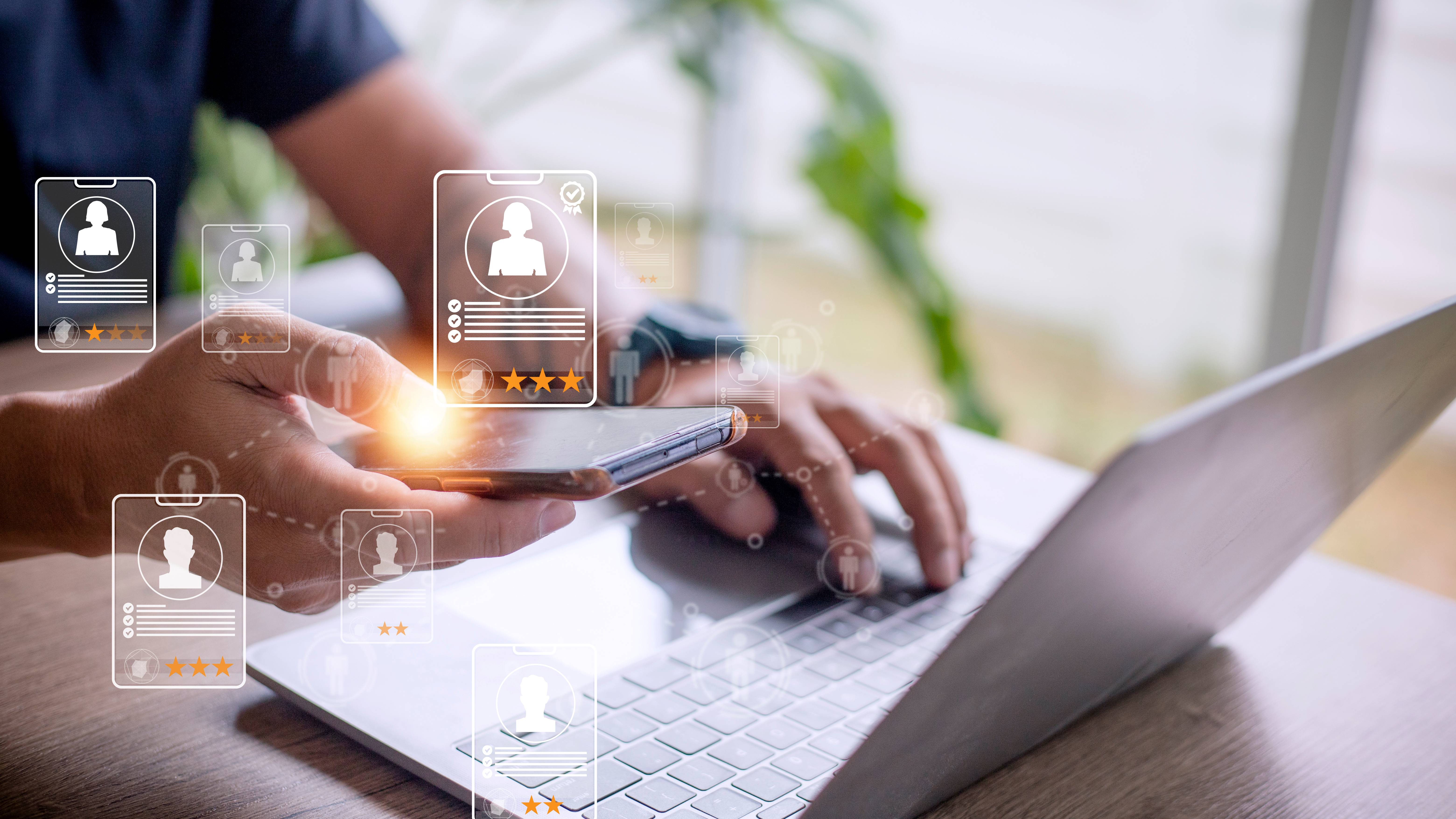 Online recruitment application specialist search service concept with virtual cards with rating and profile information on a smartphone in hand